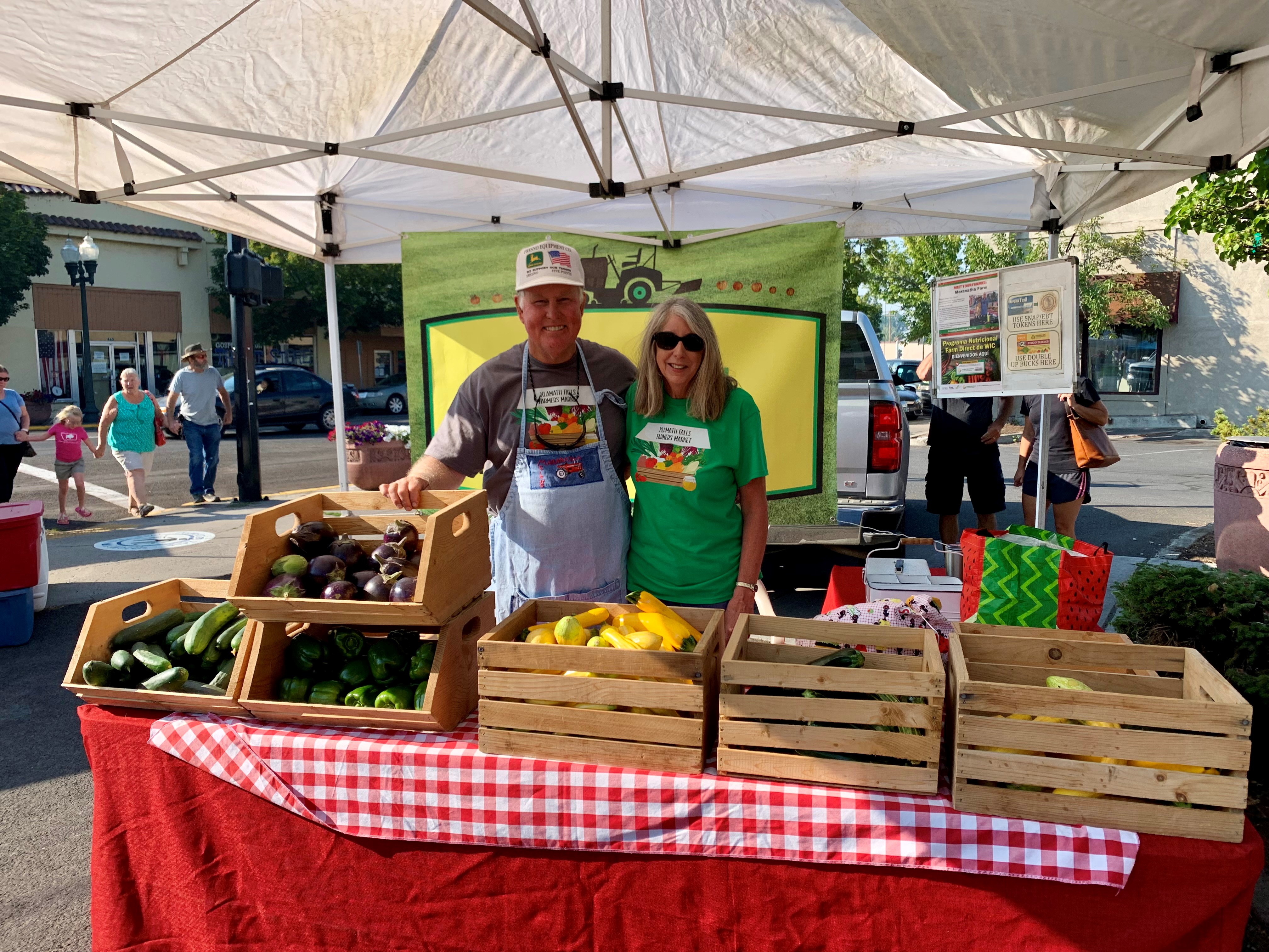John and Maryann anderson at the farmers market 2023