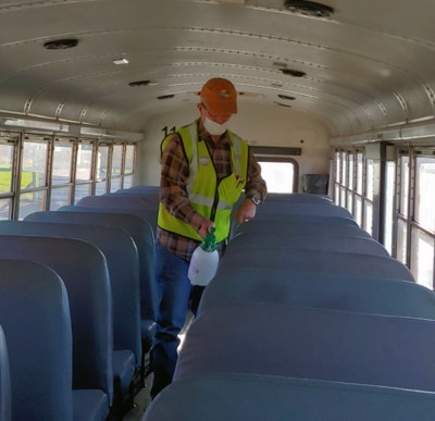 Bonanza Bus Driver Sanitizes bus